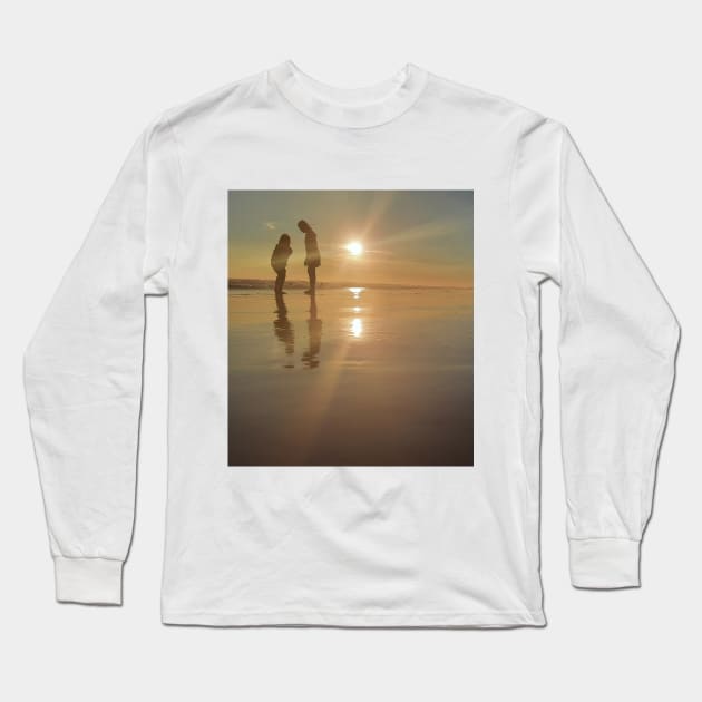 Silhouetted people in a row on a sand beach. Long Sleeve T-Shirt by kall3bu